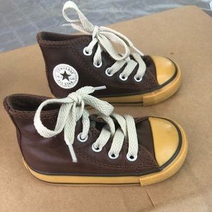 Brown leather Converse